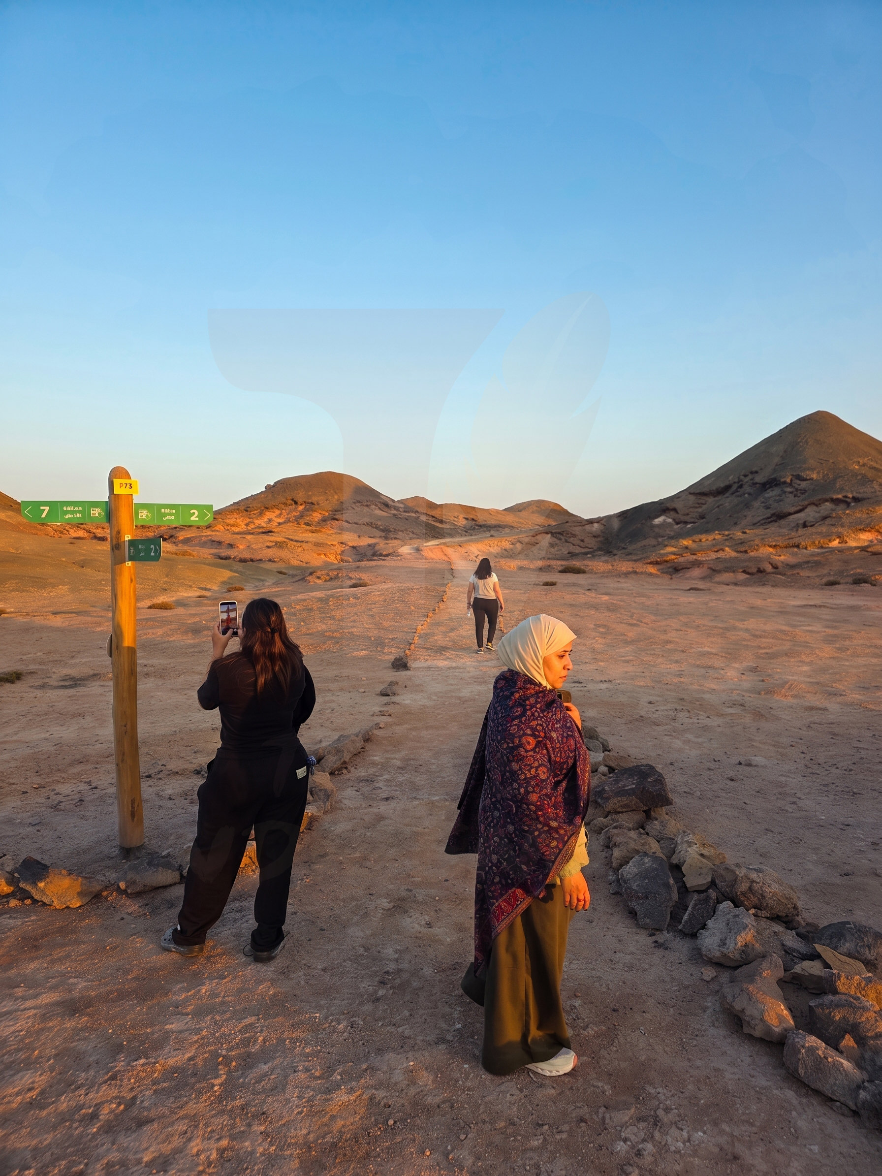 guests hiking mountain trail Guests on a guided mountain trail walk at sunset