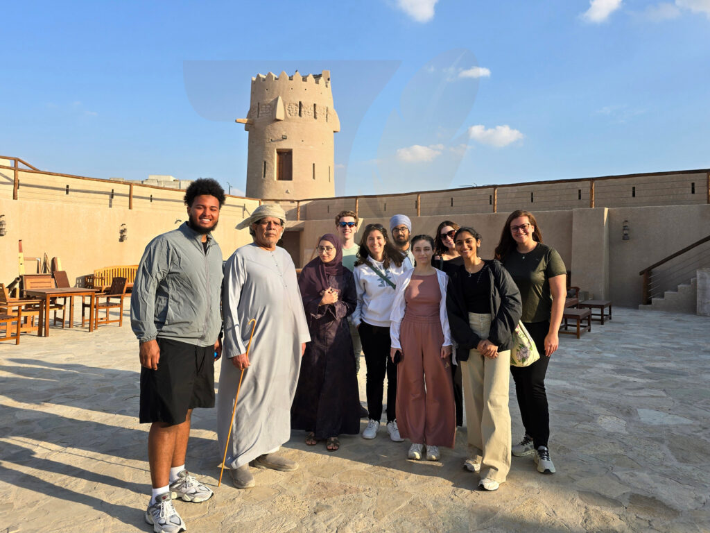 travellers with local host at heritage fort Travellers with their local host at a heritage fort